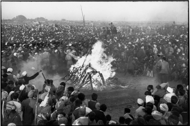 Photo of the cremation of GANDHI on the banks of the Sumna River, Delhi, India by Cartier-Bresson